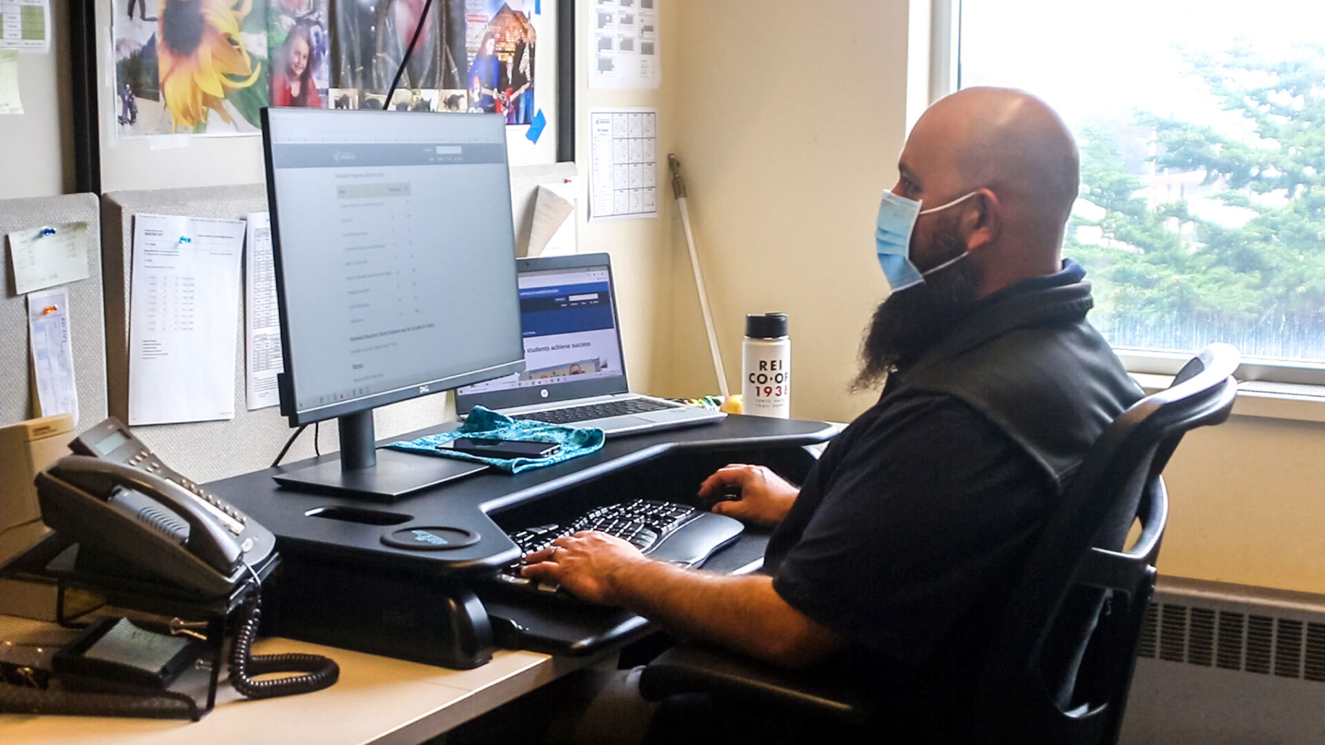 Bobby Quinonez working at his desk