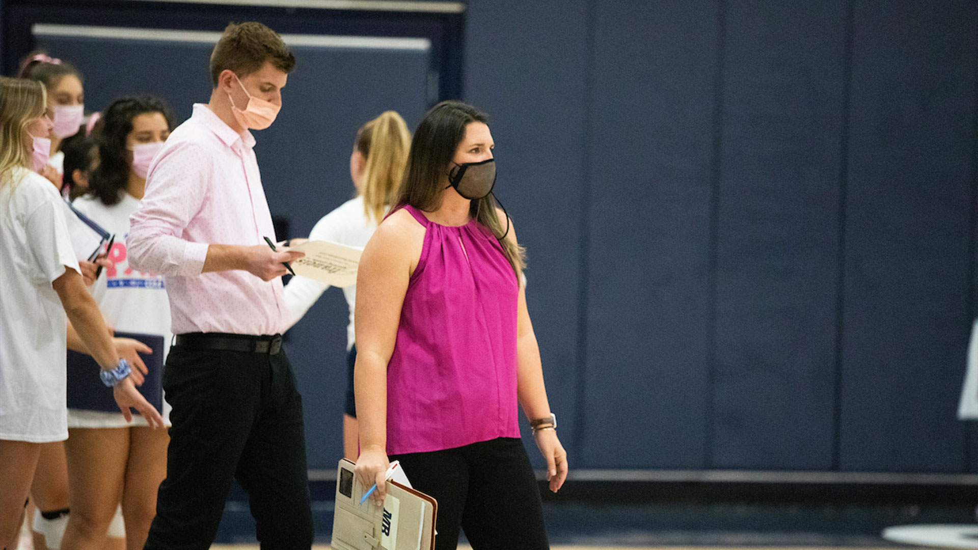 Courtney Materazzi coaching women's volleyball