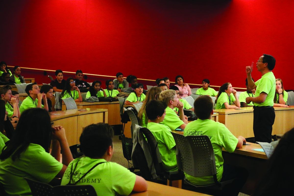 professor with students in a lecture hall