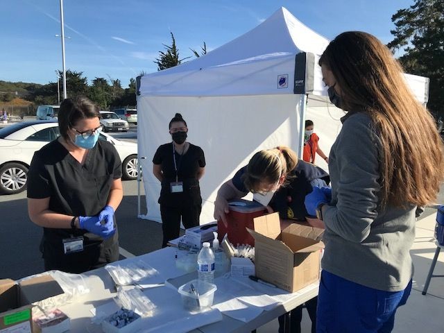 MSPA student volunteers at vaccine clinic