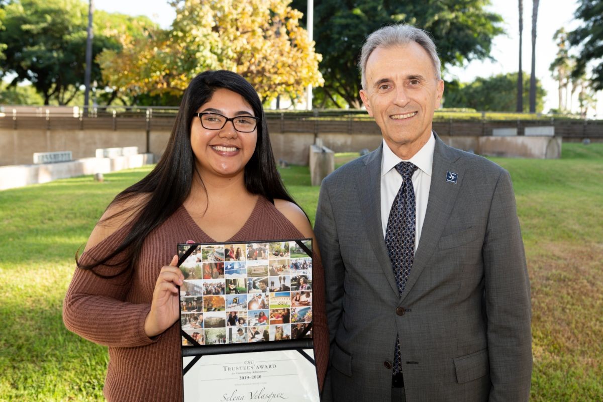 Selena Velasquez with CSUMB President Eduardo M. Ochoa.