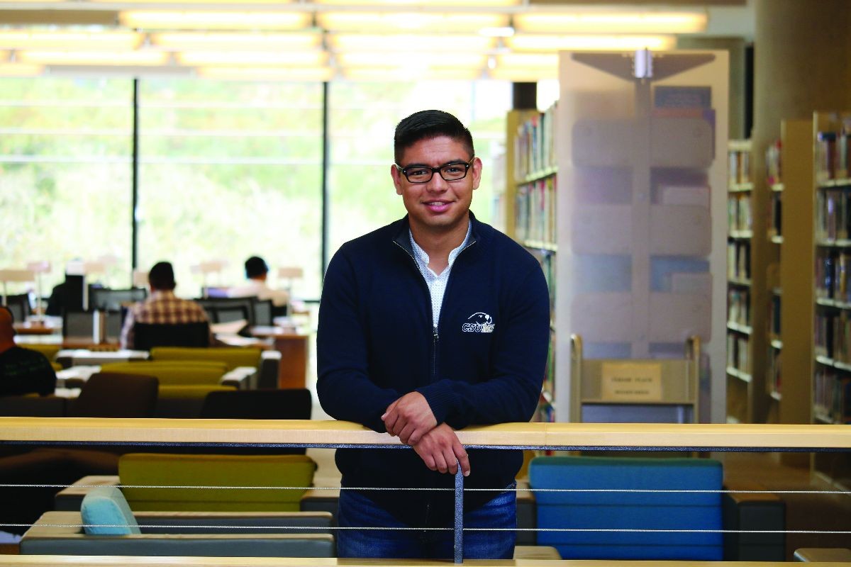 CSUMB student Heriberto Marquez at the library