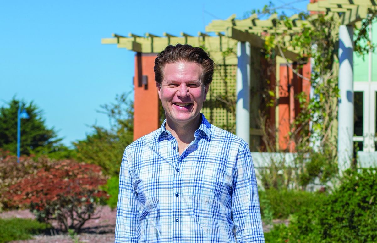 CSUMB Rev. Clark Brown poses for a photo