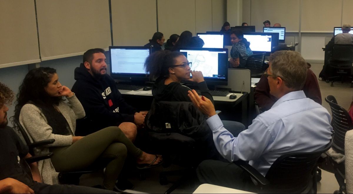 Students discuss the design of a park with Seaside City Engineer Rick Riedl.