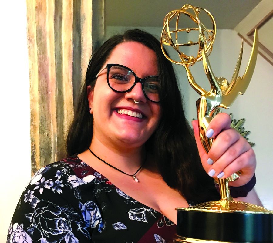 Margot holds a daytime emmy award