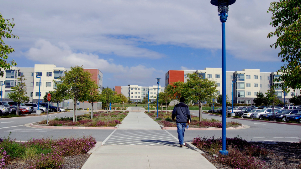 Student walking towards Promontory