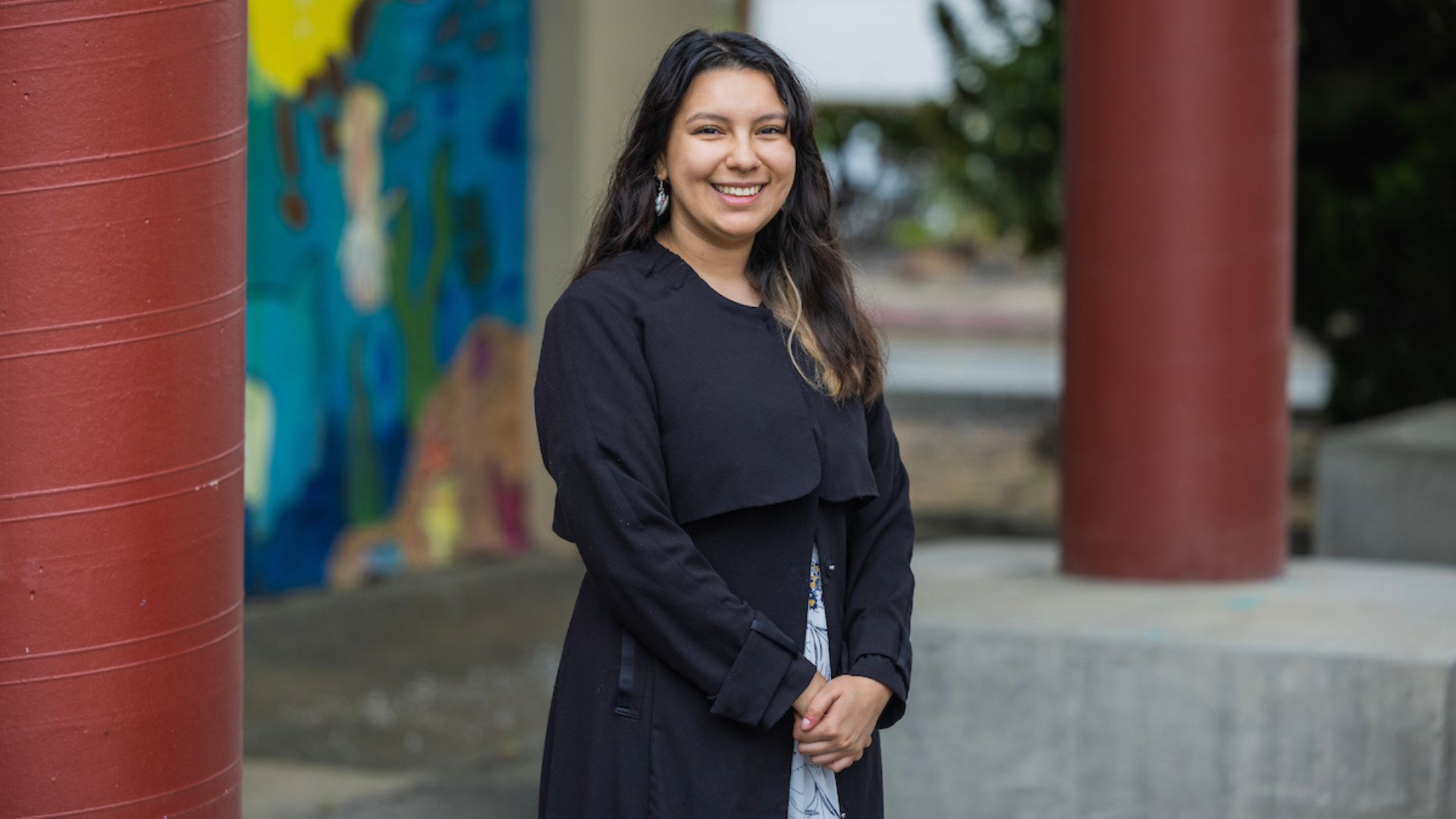 Melanie Mena smiles at camera 2023 Trustees Award Winner