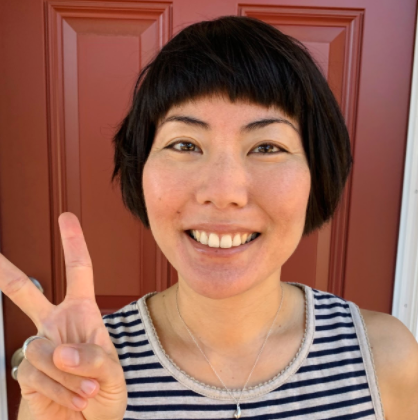 MBWLP leader Erica Hashiba flashing a peace sign