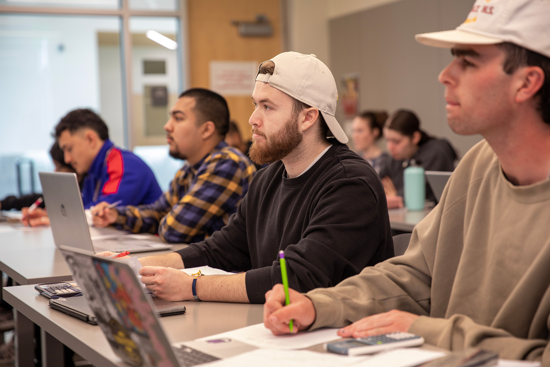 College of Business students listening at class