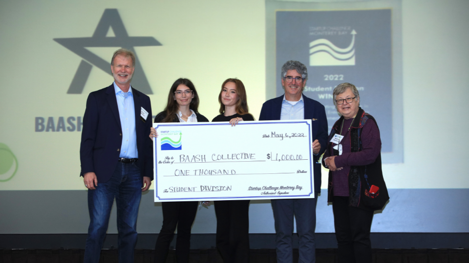 BAASCH Collective student winners holding check with Brad Barbeau, Erik Cushman, Marylou Shockley