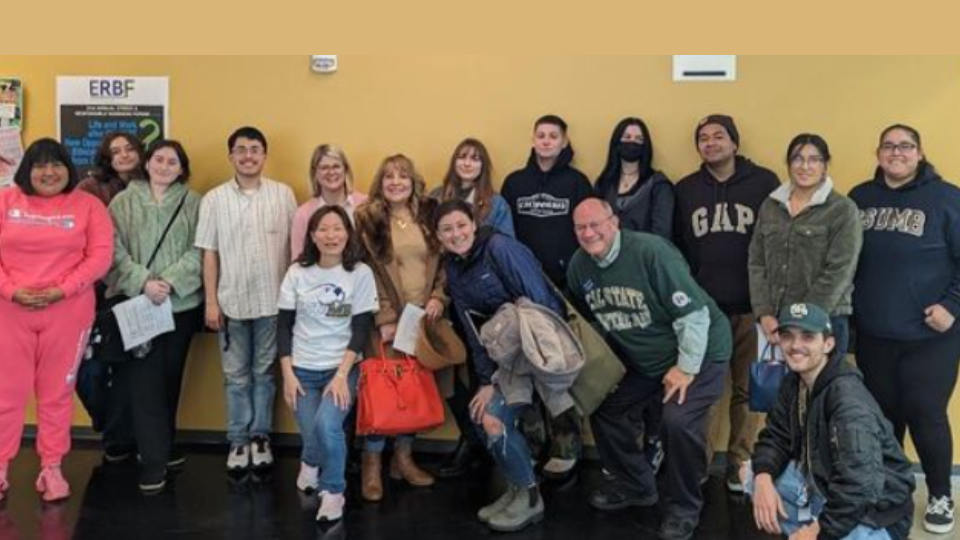 CSUMB program leaders pose with students from Marina High School's Culinary program.