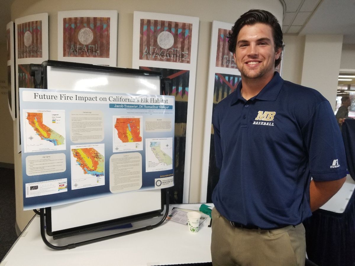 Student Jacob Tonascia Presenting his Poster at GIS DAY 2017