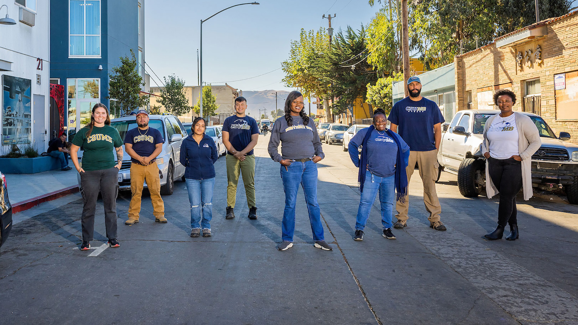 CSUMB students standing shoulder to shoulder