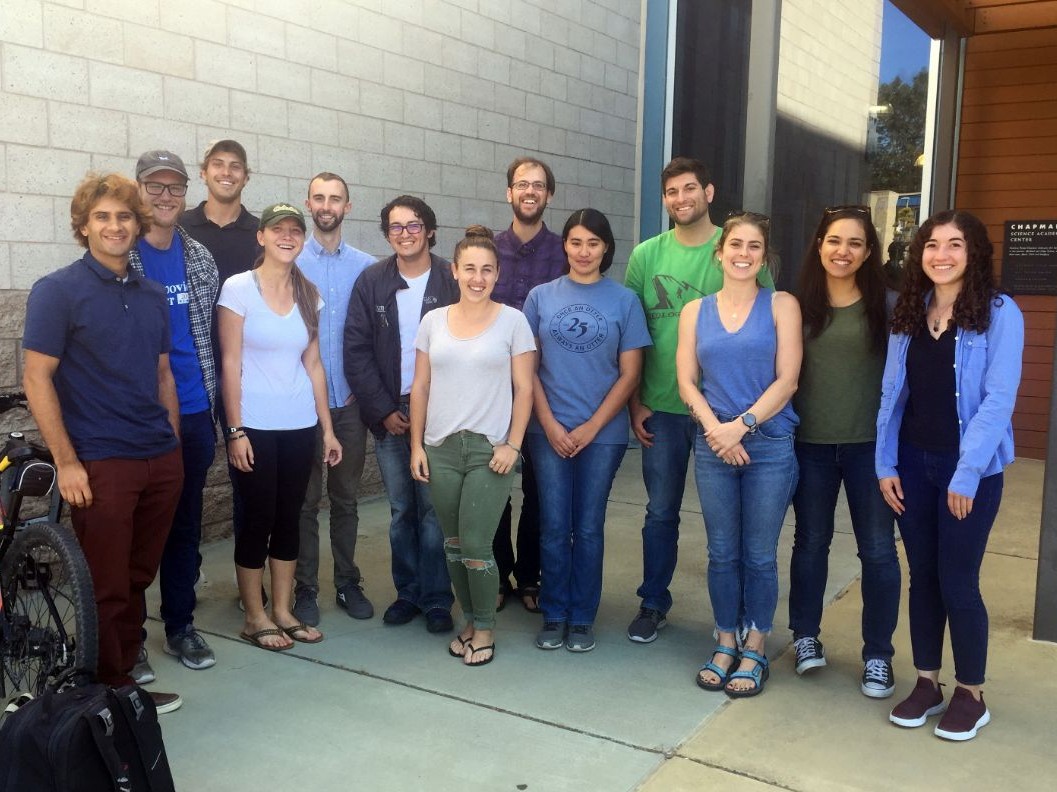 Environmental Science Master's students stand in front of the Chapman Science Academic Center