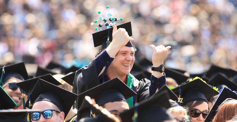 Biology student celebrating at graduation