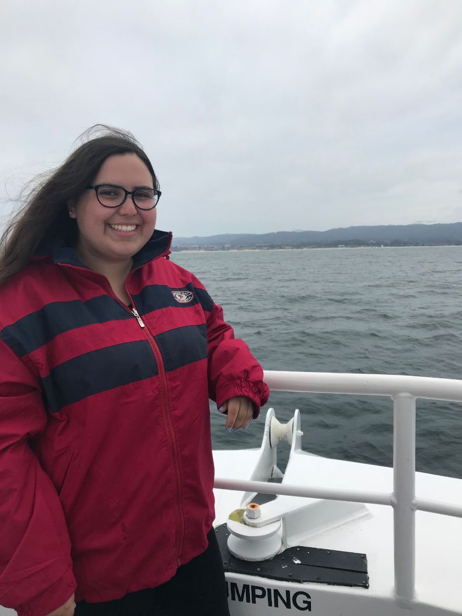 Kourtney on a whale watching boat