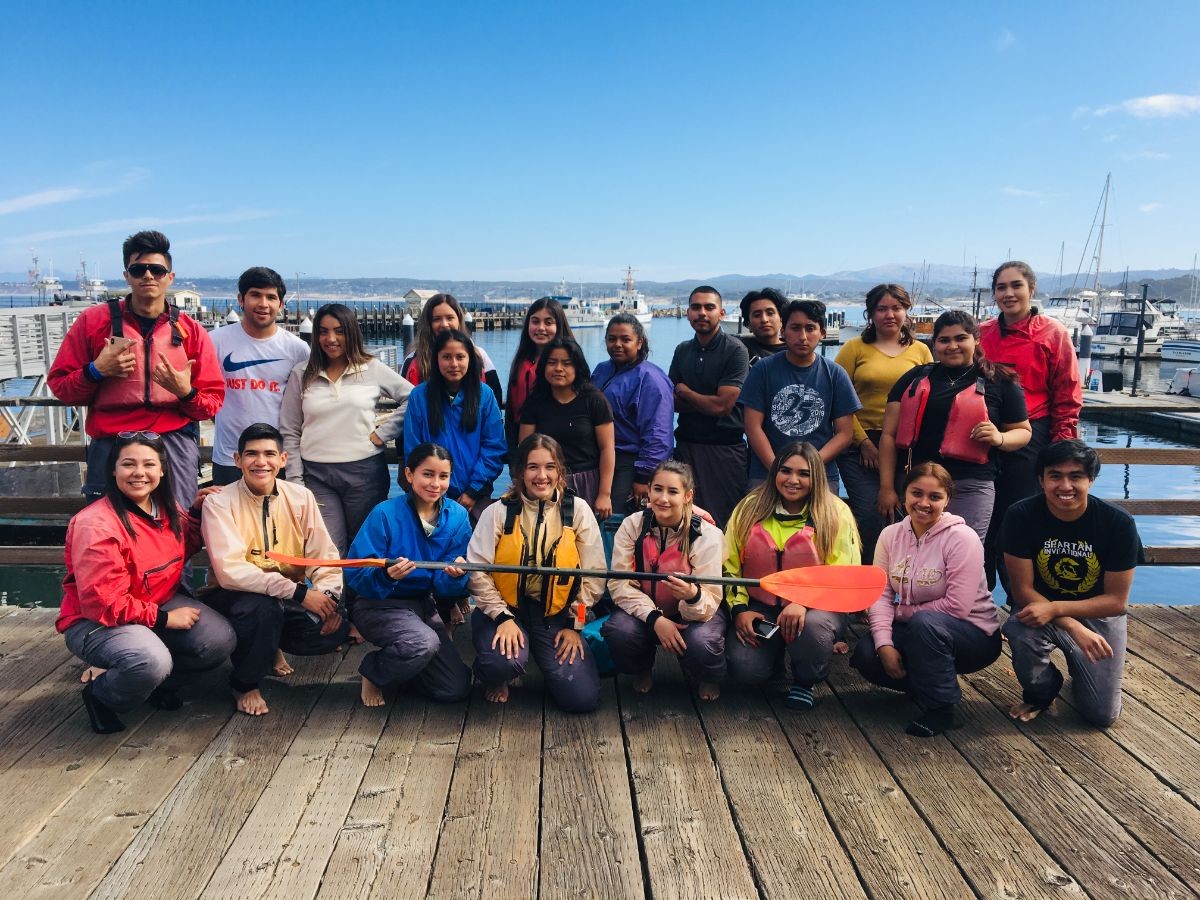 CAMP students pose for a picture at the Monterey Wharf