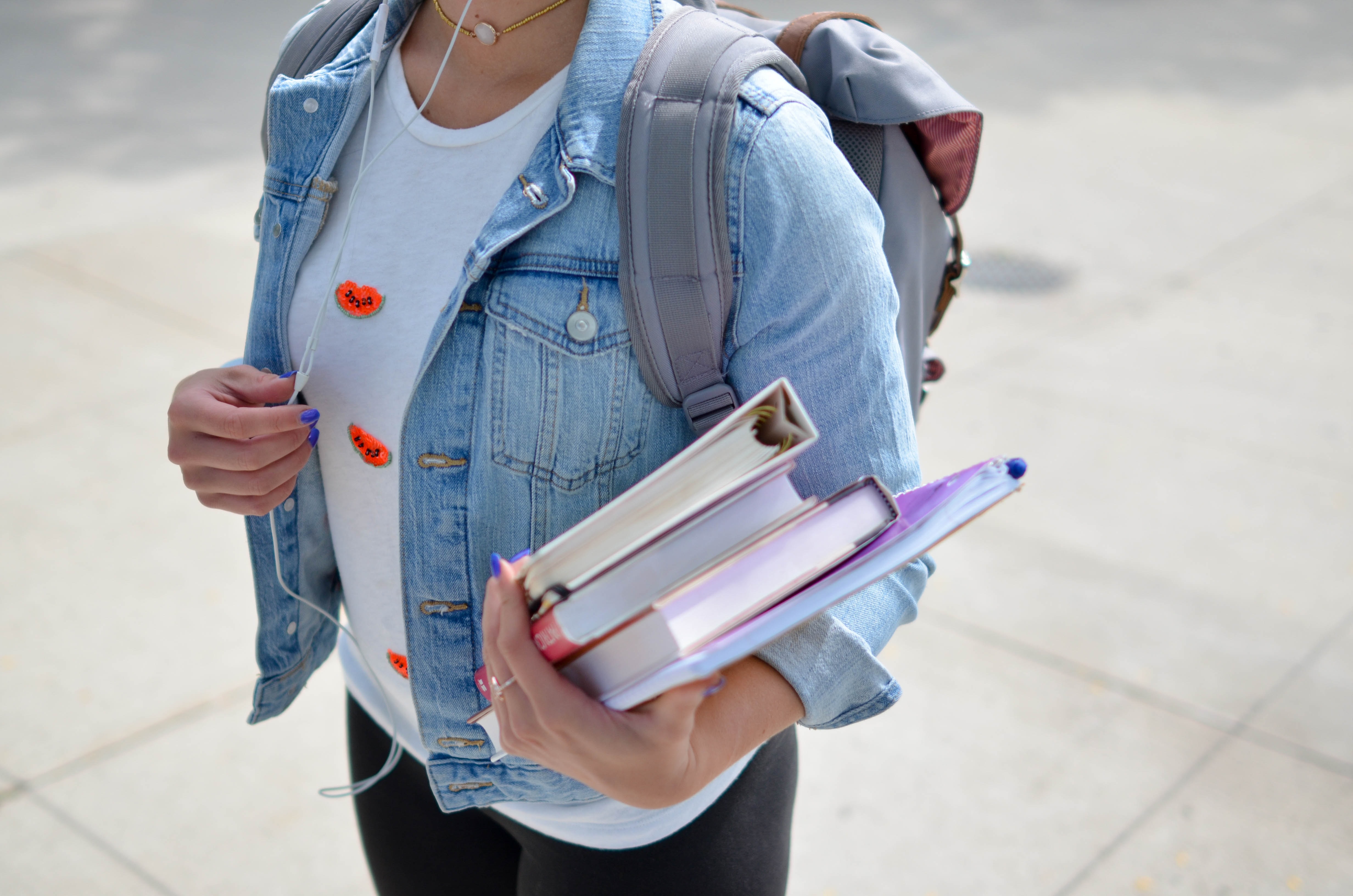 Student holding textbook