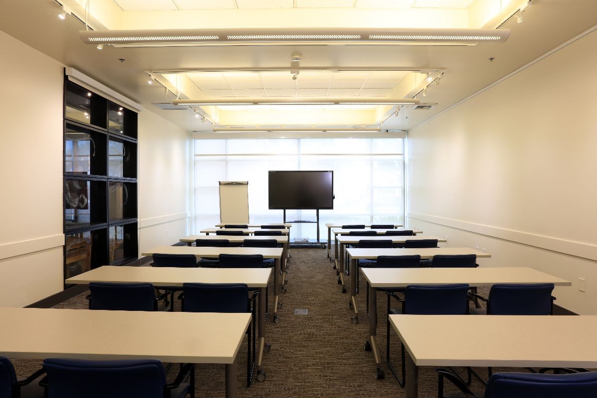 Gabilan room set up in two vertical rows with tables and chairs