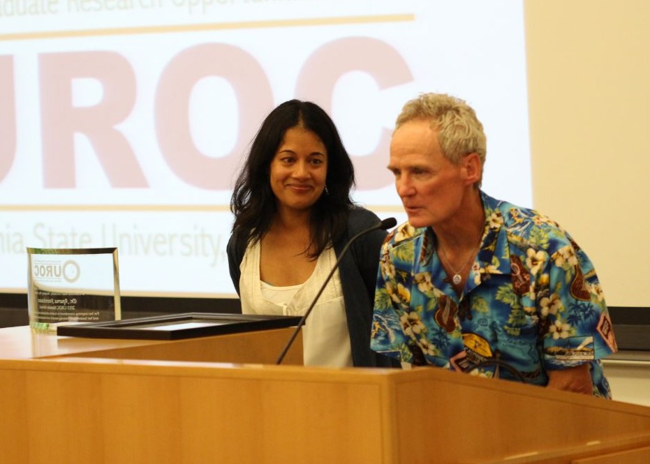 William Head, UROC Director, (R) presents Dr. Sreenivasan with UROC Mentor Award