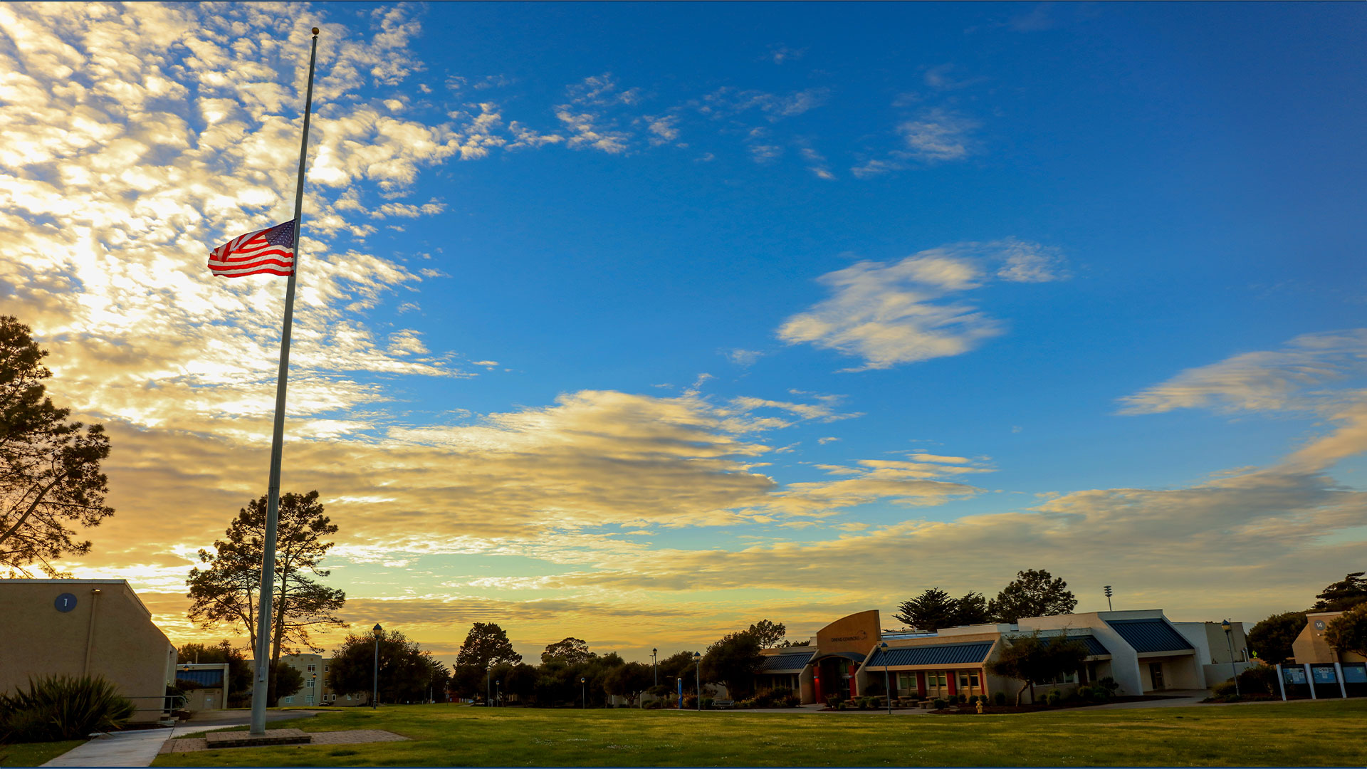 Photo: American flag at half mast in quad