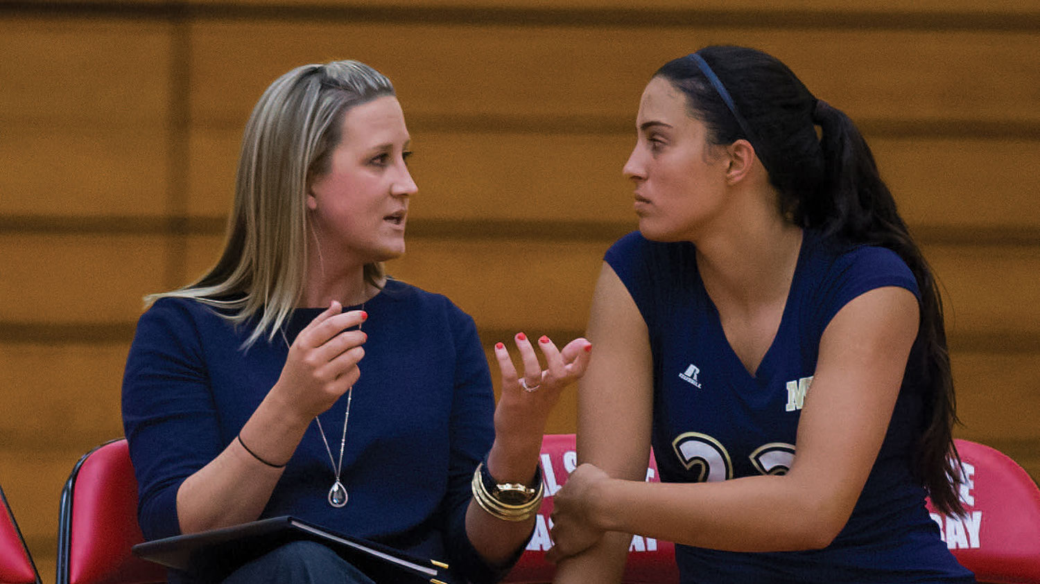 Photo: Moe Melhart advising a student athlete