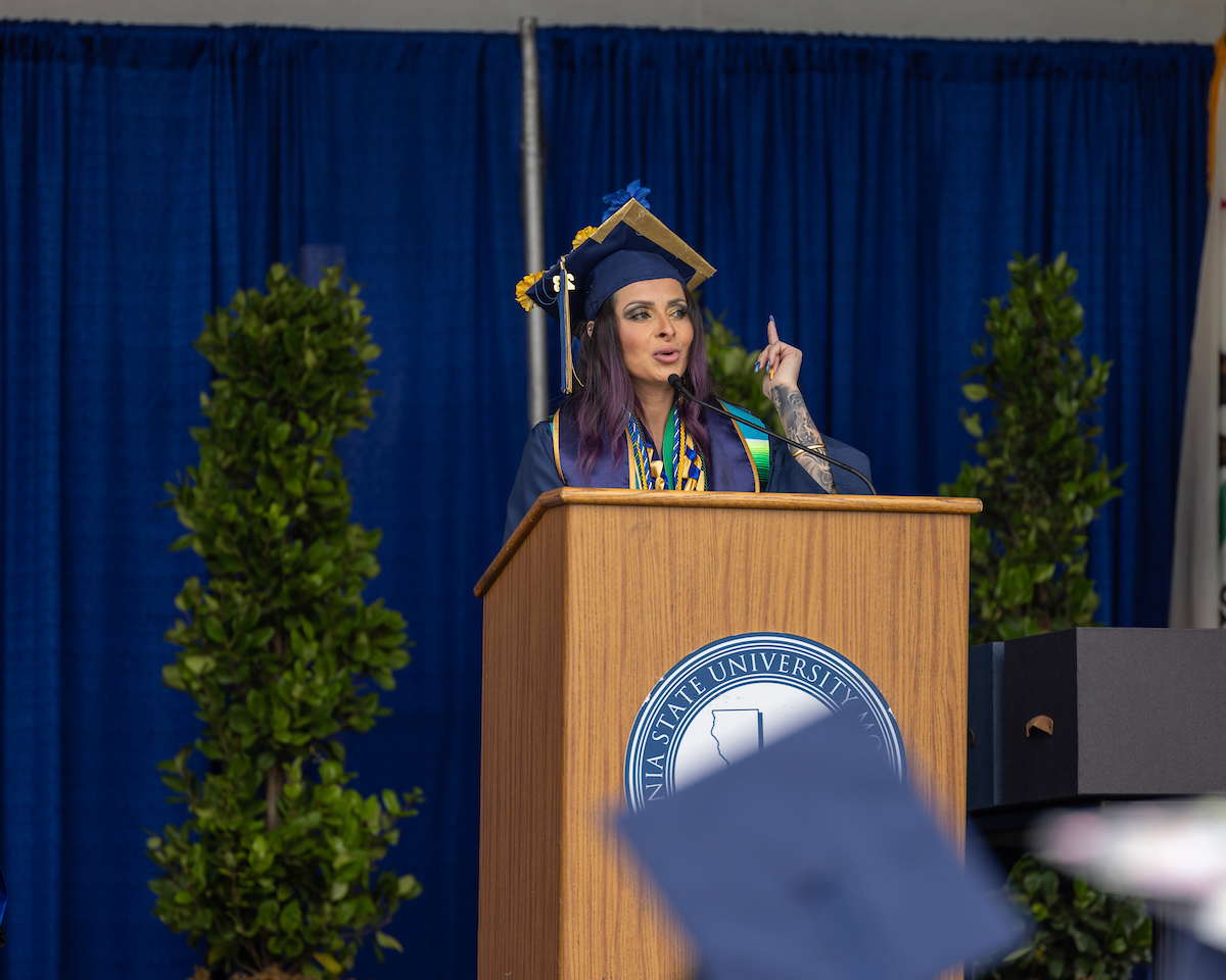 Diane Ruiz speaking at the CAHSS Convocation